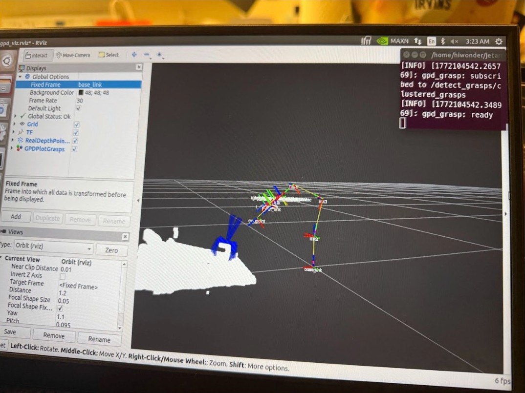 RViz on the robot's laptop: a white point cloud of the scanned scene with blue candidate gripper poses generated on it, the GPDPlotGrasps display layer enabled, and a terminal reporting that gpd_grasp has subscribed to /detect_grasps/clustered_grasps.